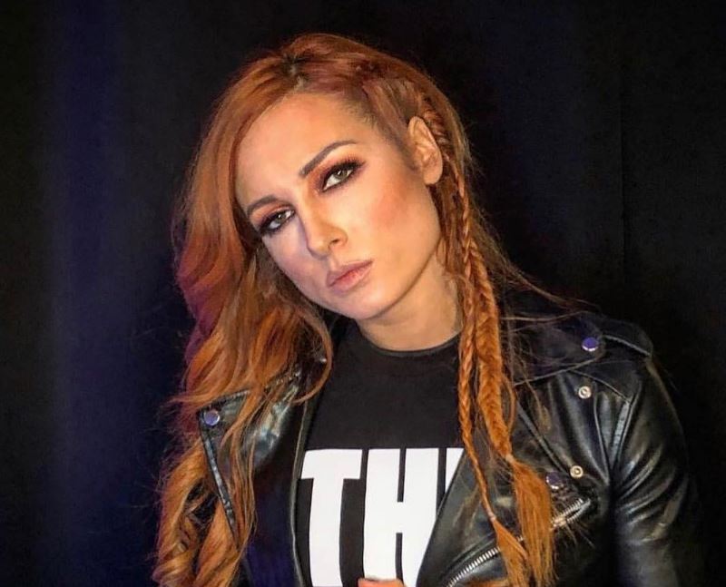 Becky Lynch boob job body measurements lips